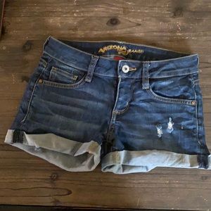 ripped blue jean shorts